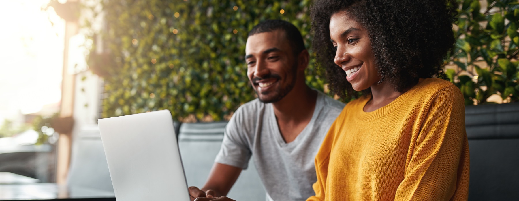 Couple looking at laptop