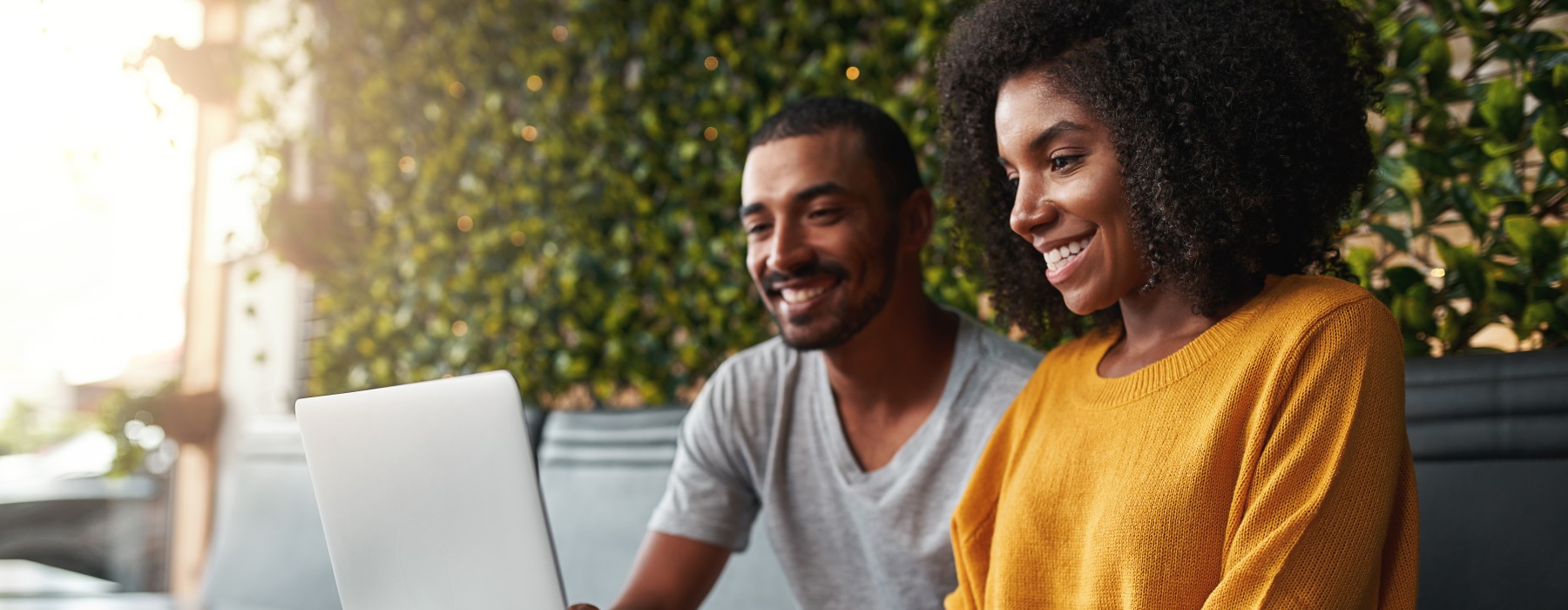 Couple looking at laptop