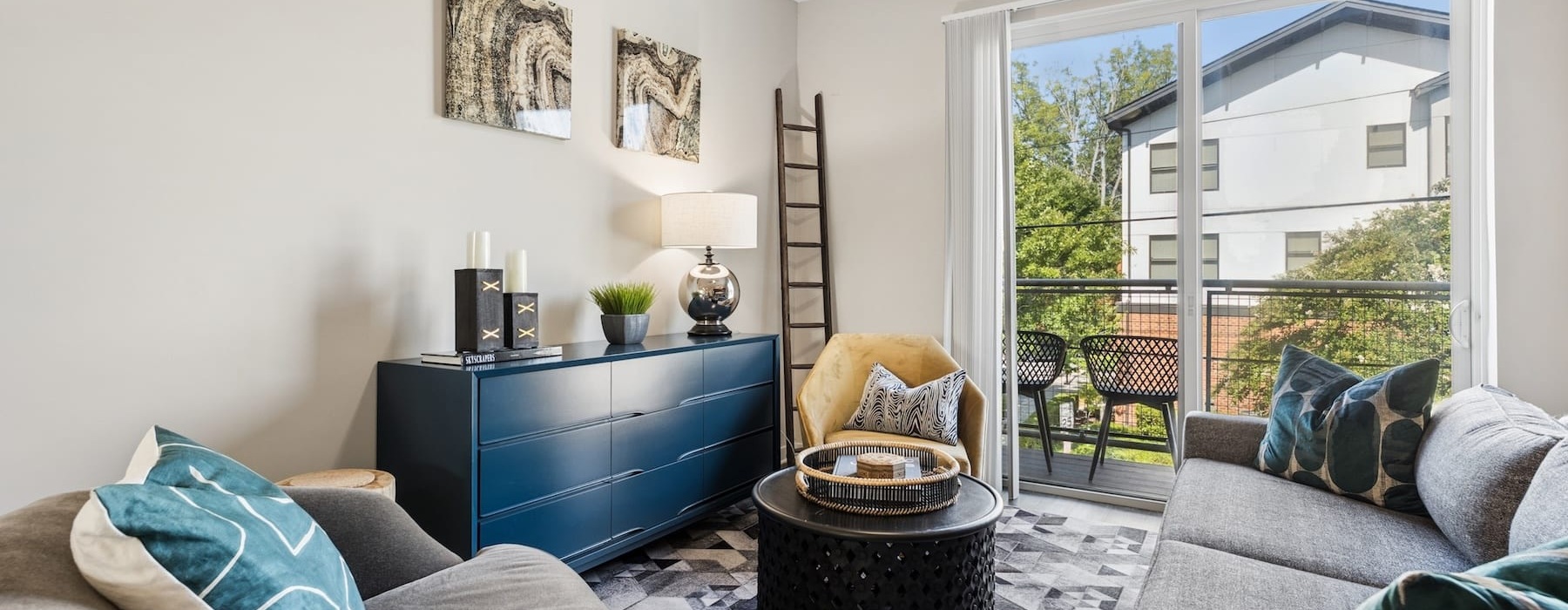 living area that includes ample seating spaces and bright lighting