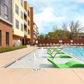 Pool Sparkling, pool with lounge chairs in pool at Main + Stone