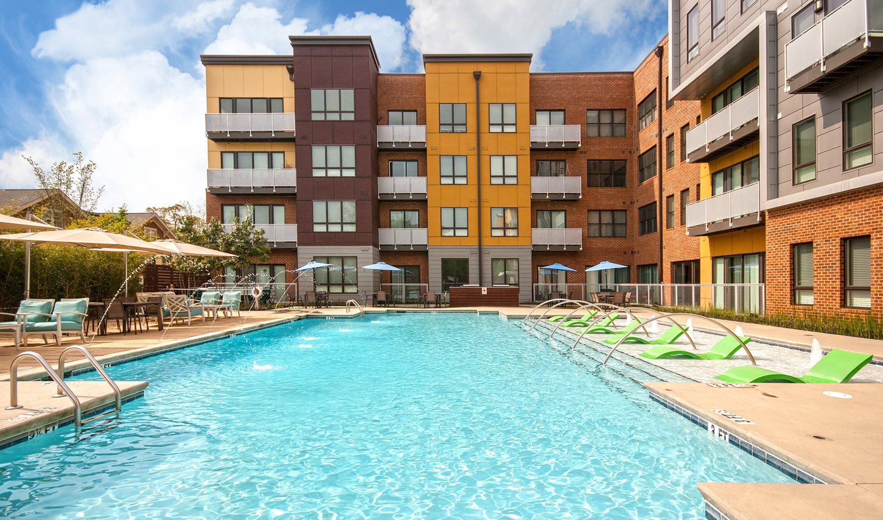 Outside The Box Sparkling outdoor pool available to residents at Main + Stone